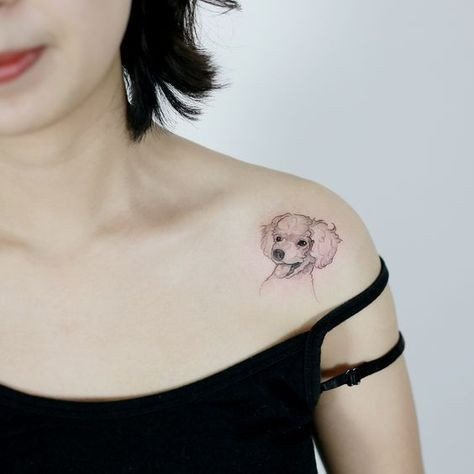 Hình xăm con chó thể hiện cá tính người sinh năm 1999