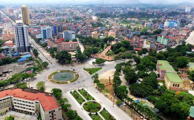 Đồi chè Tân Cương Thái Nguyên xanh mướt, biểu tượng của vùng đất để bạn viết về nơi mình sống tiếng Anh