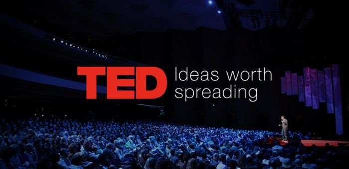Logo TED Talks và hình ảnh diễn giả trên sân khấu