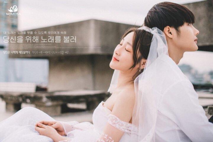 Cô dâu và chú rể trong đám cưới, gợi lên cảm xúc khi mơ thấy người yêu cưới người khác