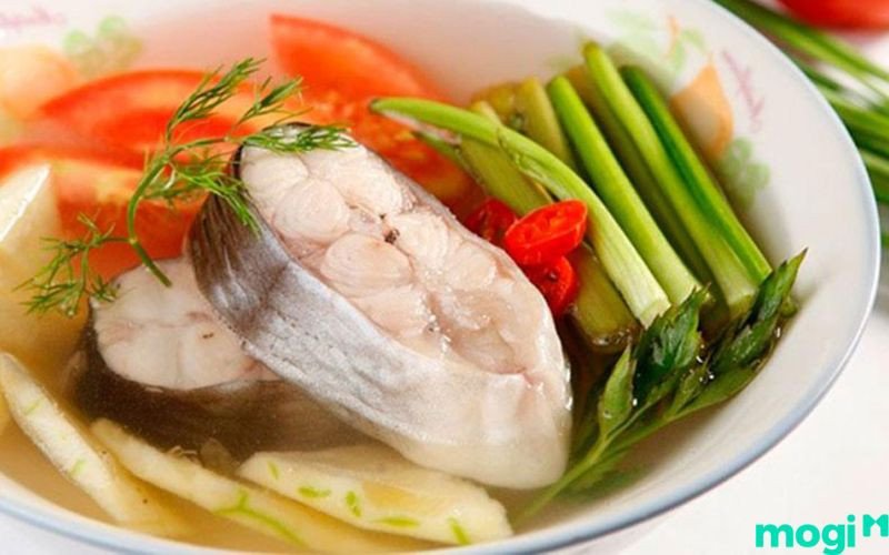 Điềm báo mơ thấy đang nấu cá