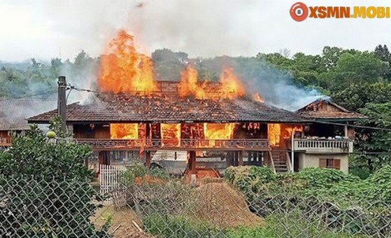 Người phụ nữ lo lắng khi chiêm bao thấy cháy nhà và điềm báo